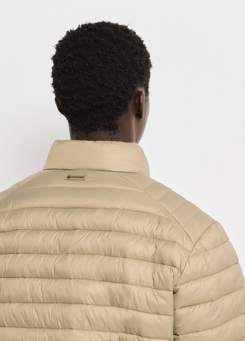 Бежева демісезонна куртка Springfield