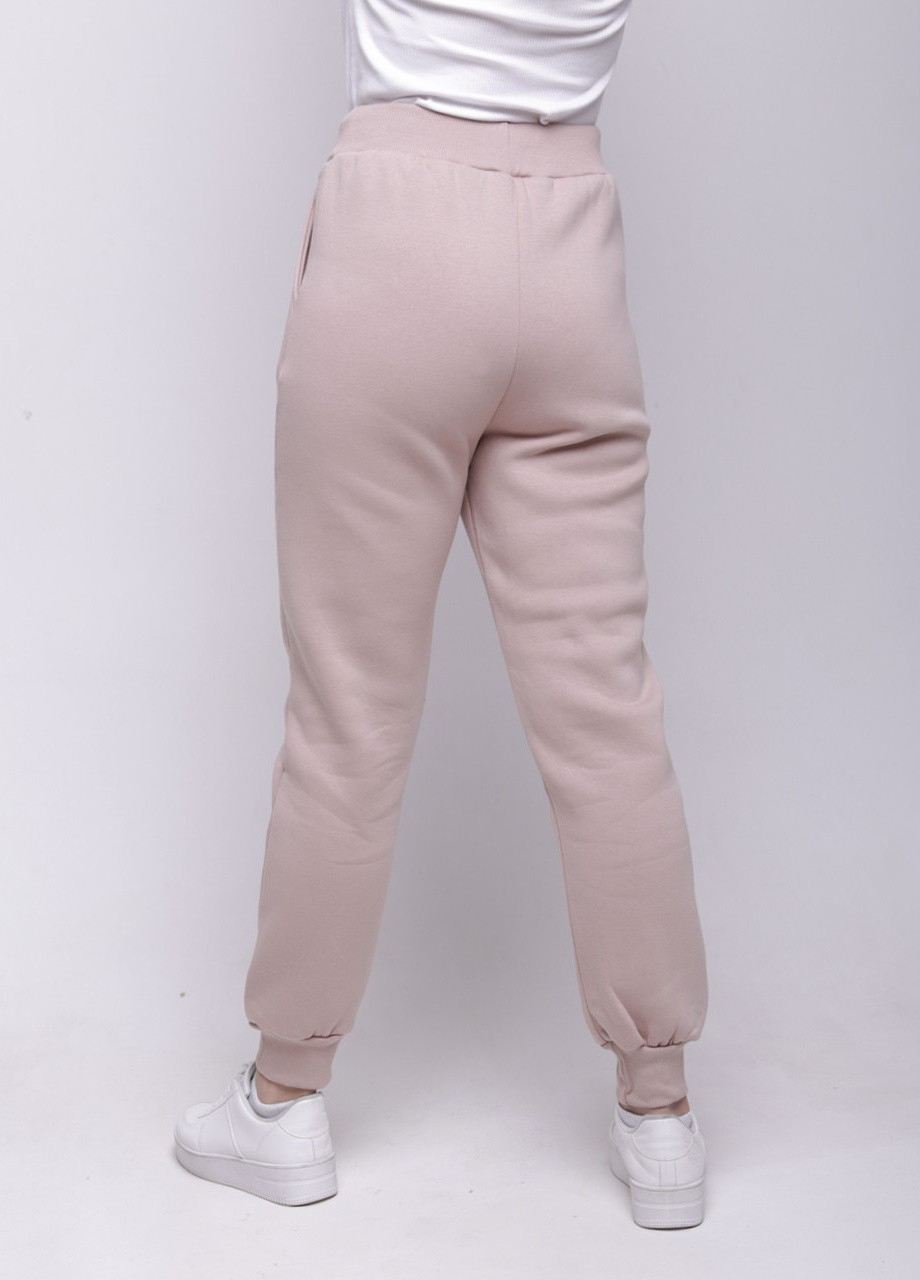 Спортивні жіночі штани на флісі рожеві великий розмір JEANSclub свободные (255920409)