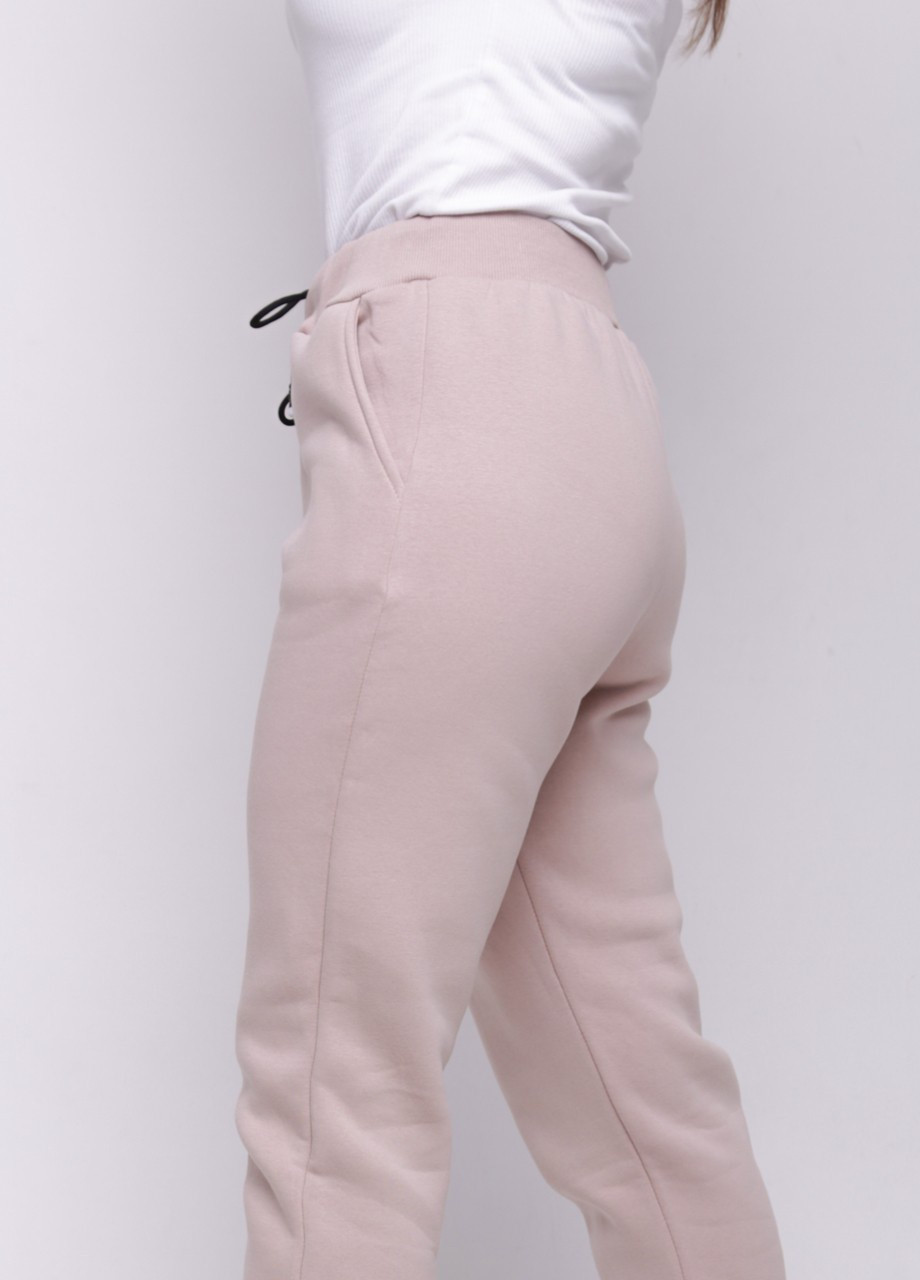 Спортивні жіночі штани на флісі рожеві великий розмір JEANSclub свободные (255920409)