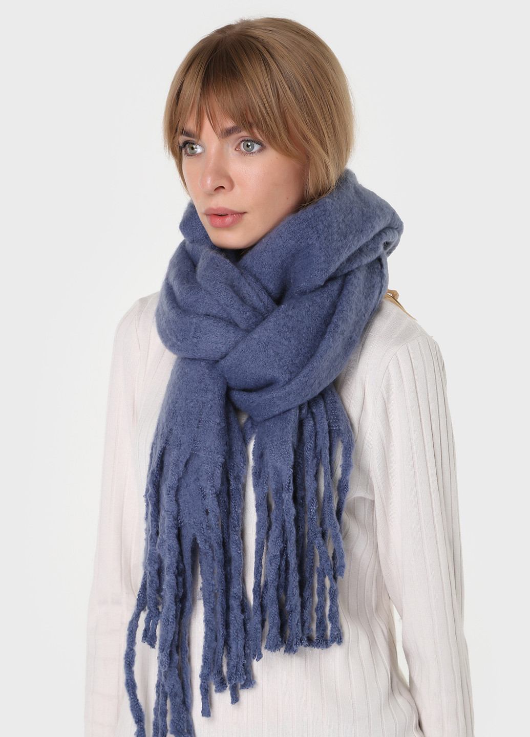 Теплий зимовий вовняний шарф з китицями (185*40см) 446004 Merlini однотонний синій кежуал вовна