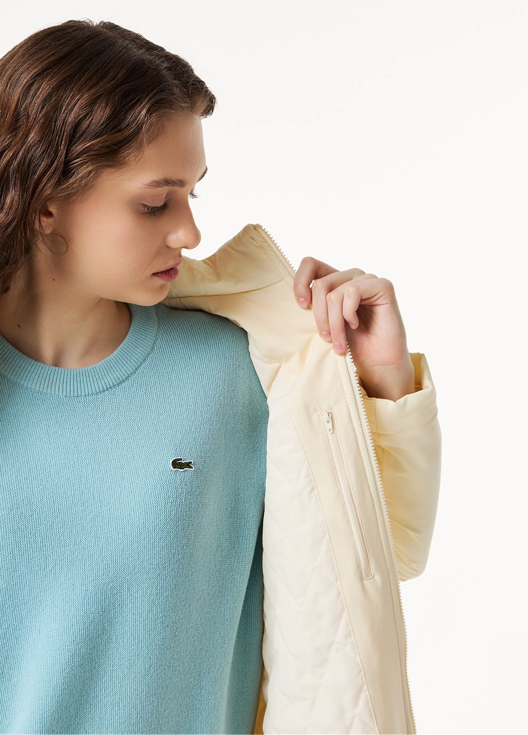 Бежевая зимняя куртка Lacoste