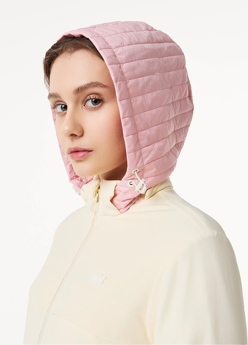 Бежевая зимняя куртка Lacoste