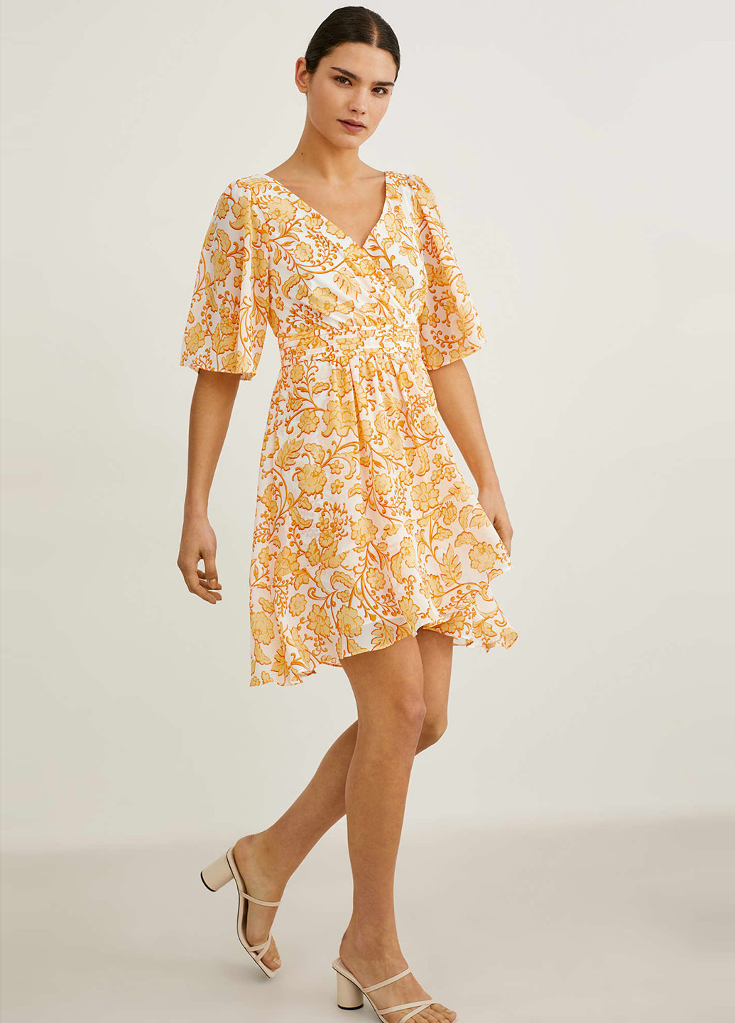 Світло-оранжева кежуал сукня кльош C&A з квітковим принтом