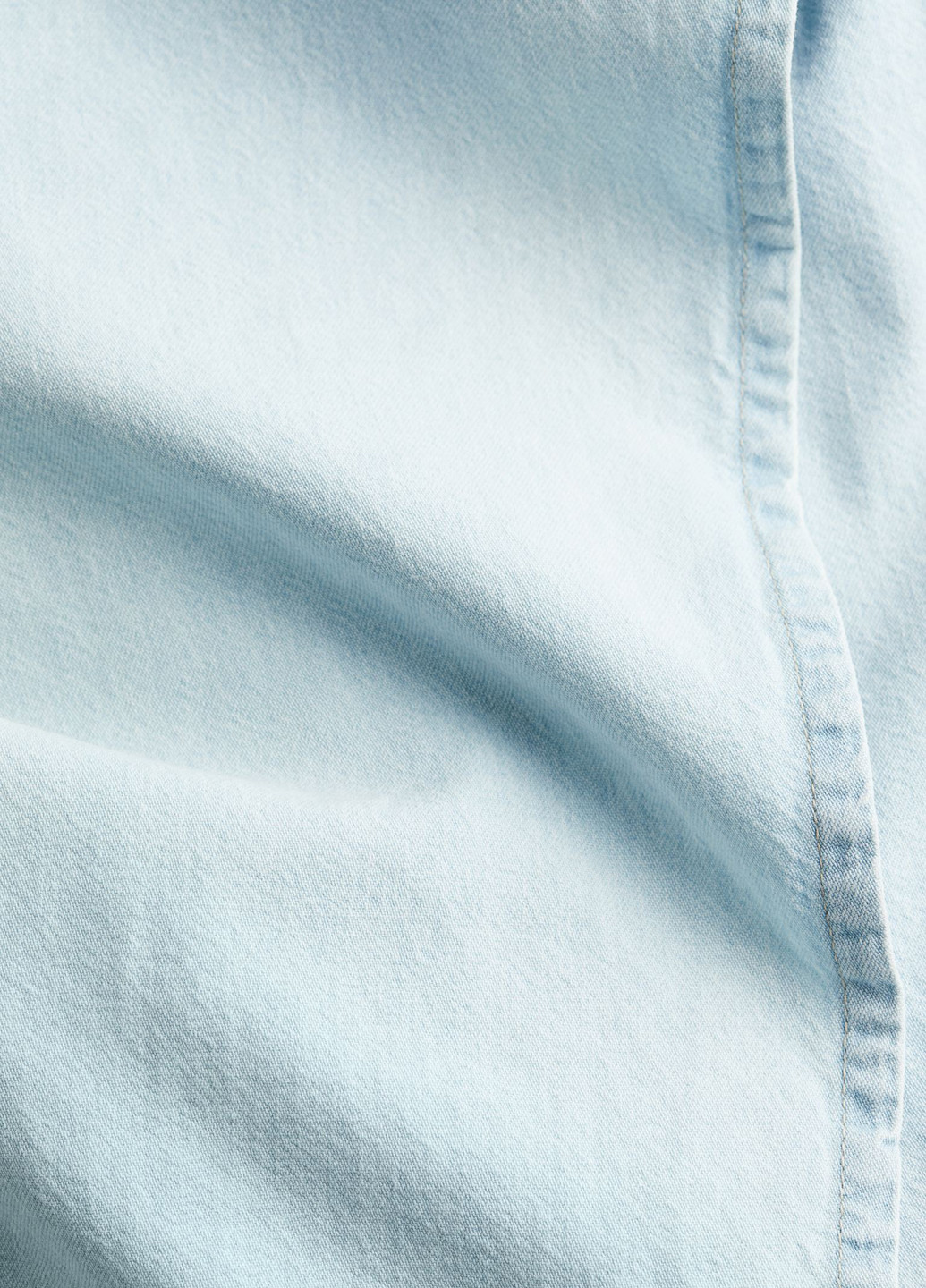 Светло-голубая джинсовая однотонная юбка H&M на запах