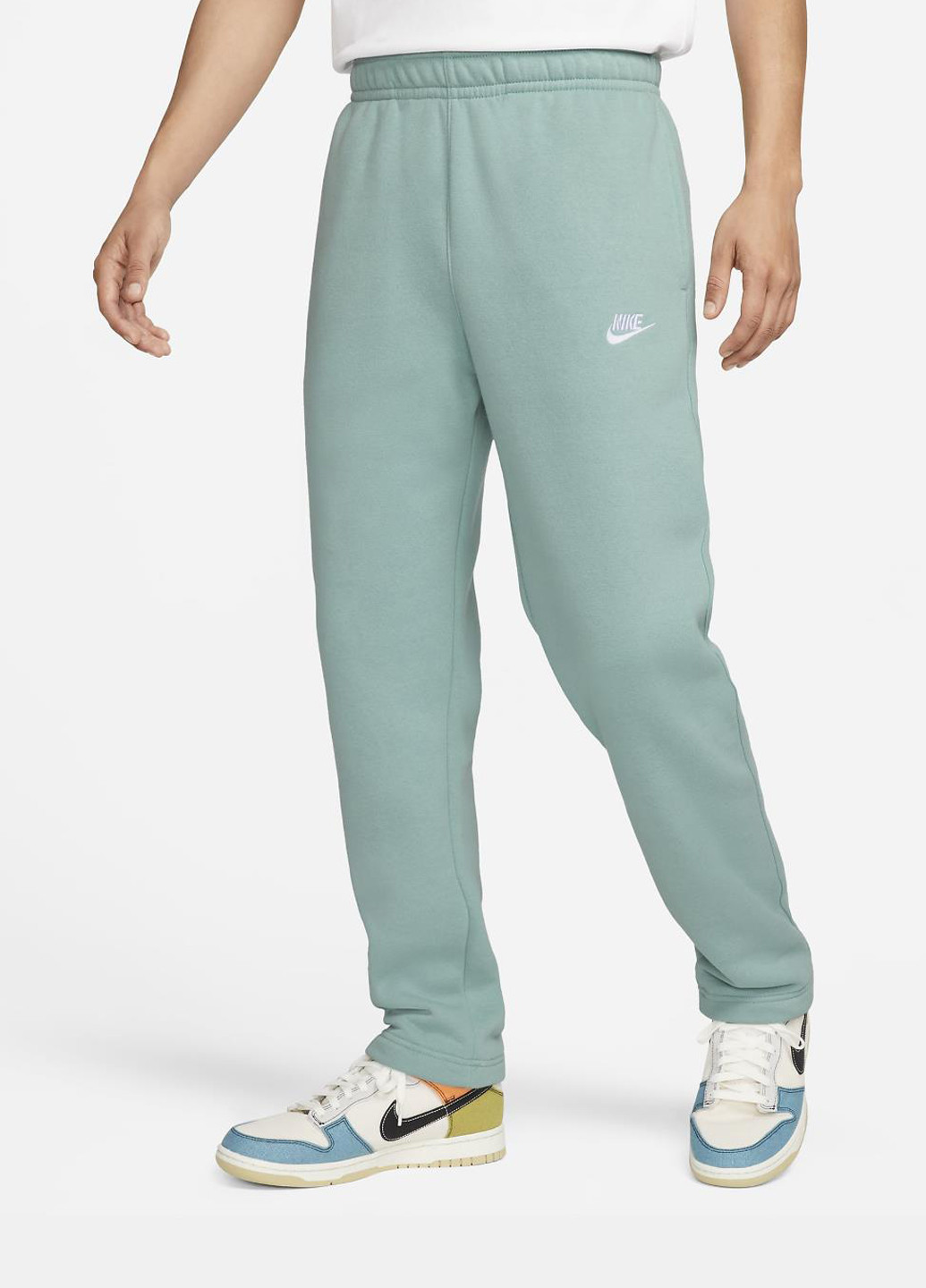 Мятные спортивные демисезонные прямые брюки Nike