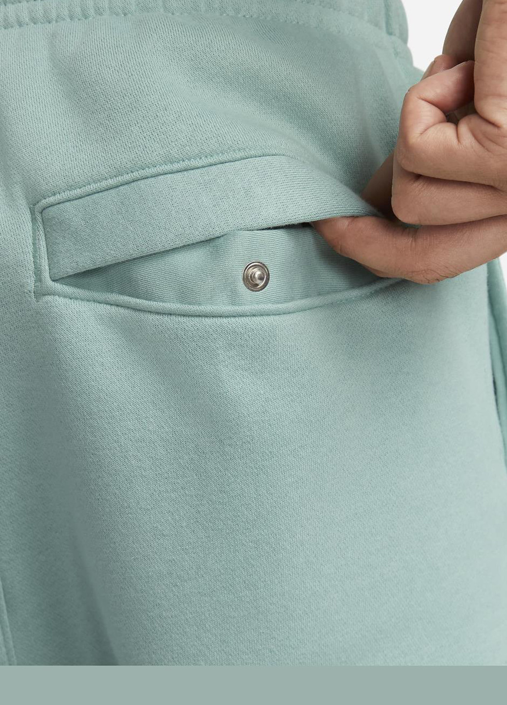 Мятные спортивные демисезонные прямые брюки Nike