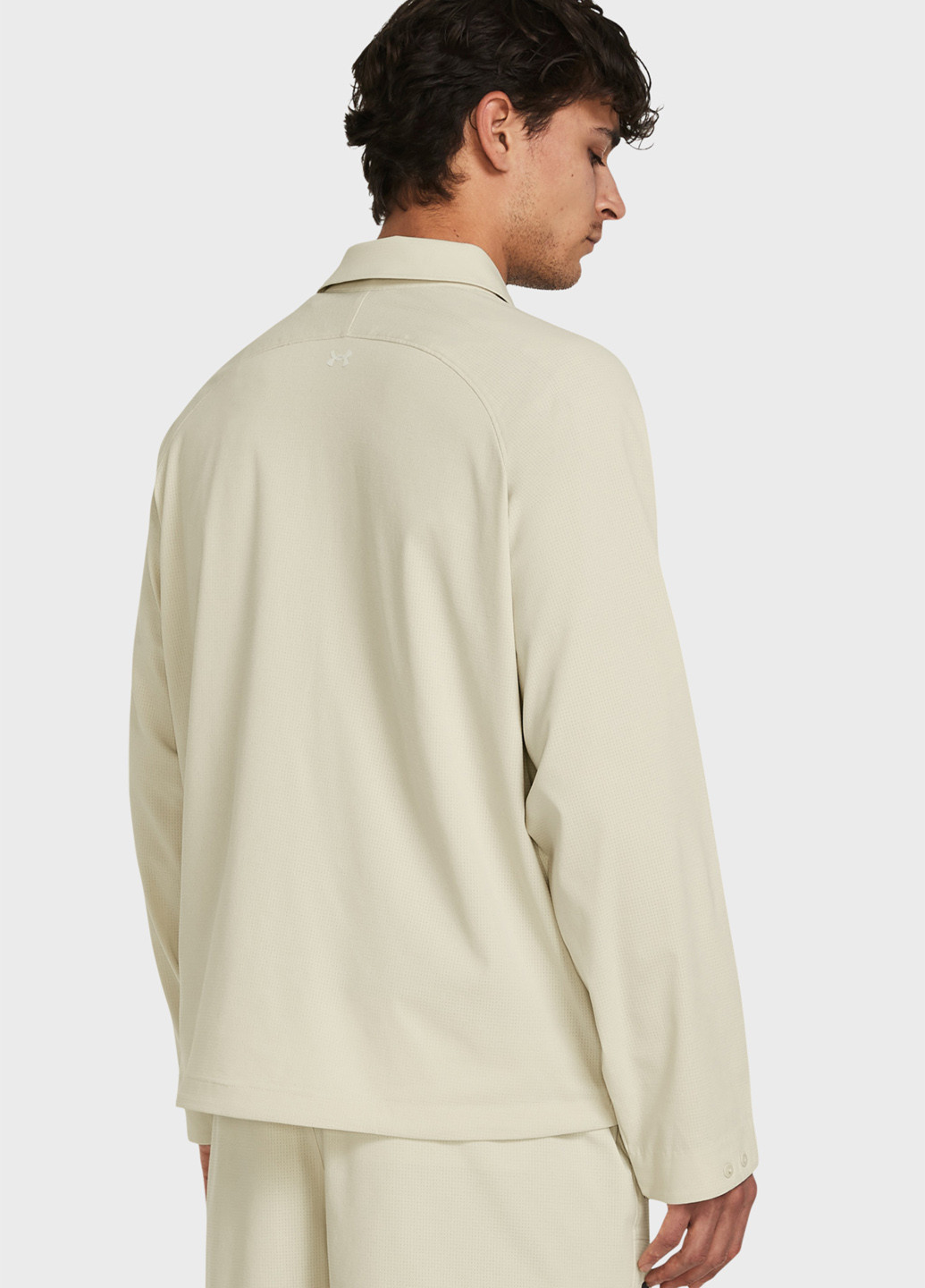 Бежевая демисезонная ветровка Under Armour