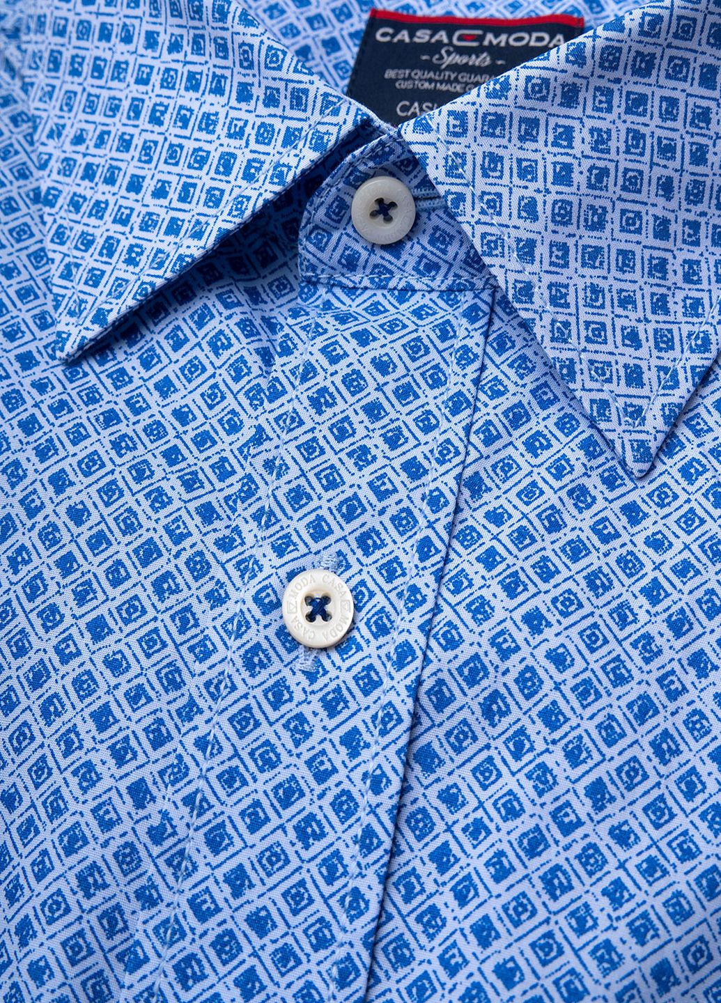 Синяя рубашка с абстрактным узором Casa Moda