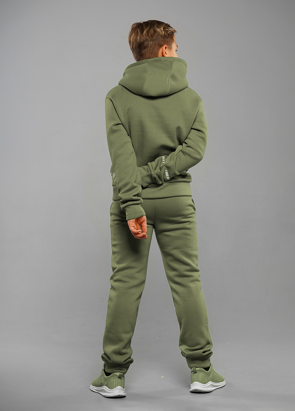 Оливковий (хакі) зимовий спортивний костюм з написами Sinthia Aris (256244560)
