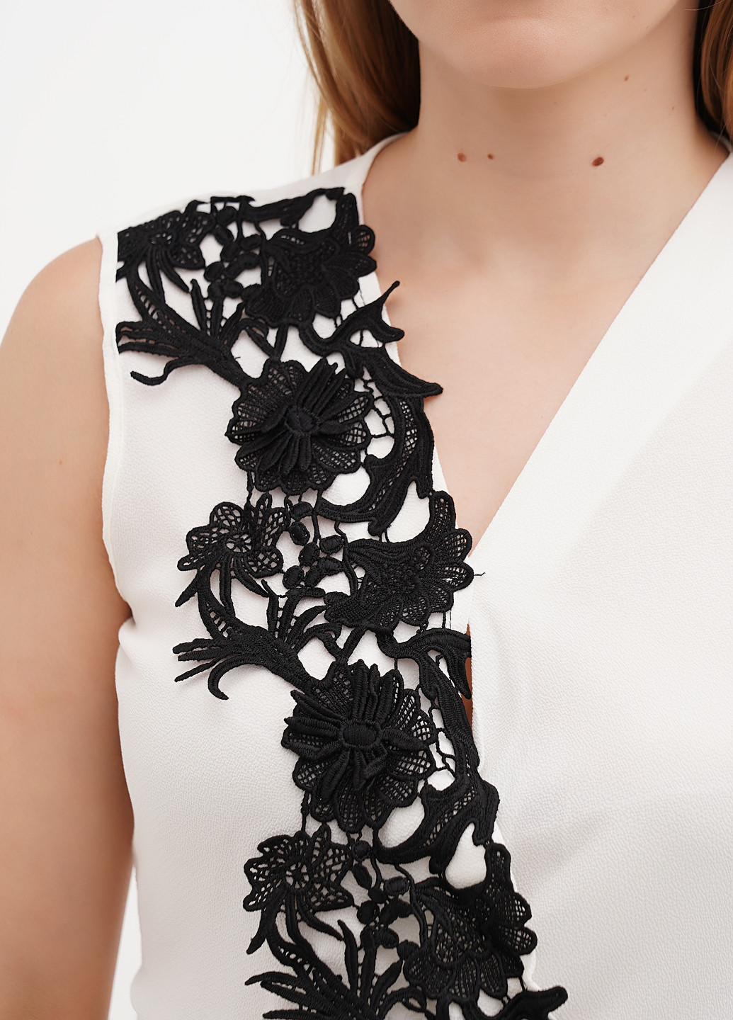 Молочна блуза з баскою Sassofono Club