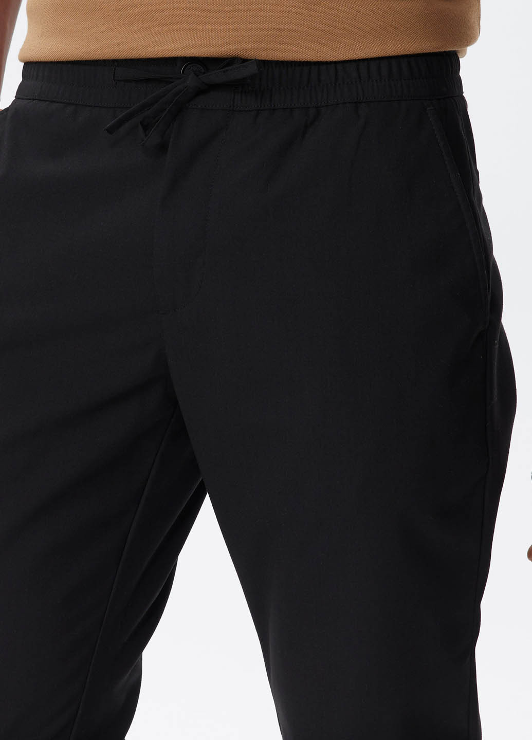 Черные кэжуал демисезонные зауженные брюки Lacoste