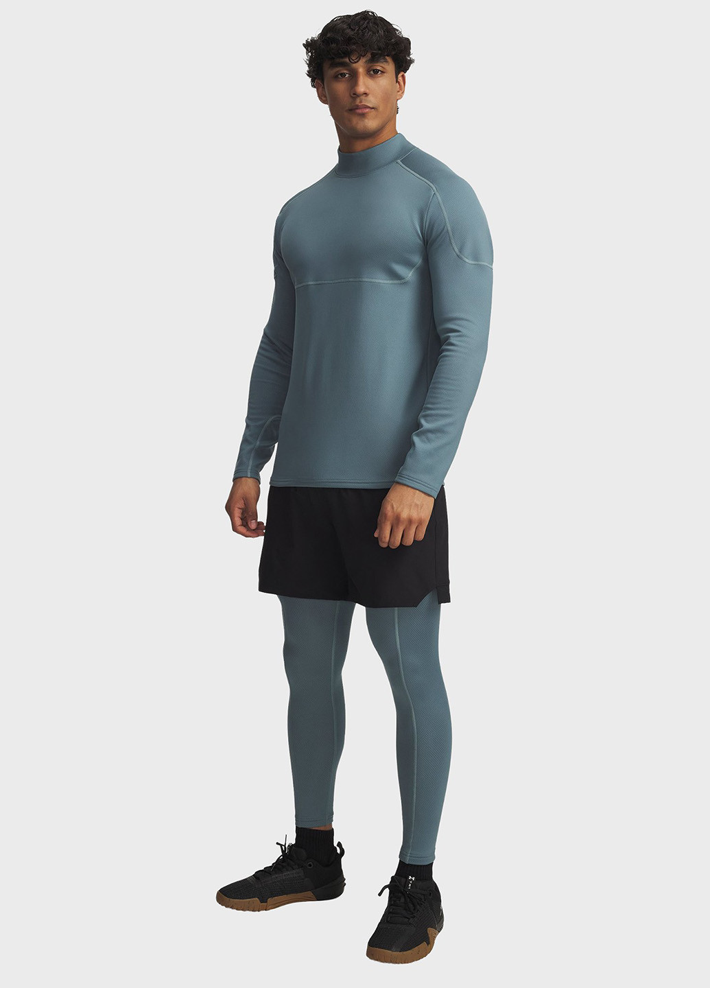 Синие демисезонные легинсы Under Armour