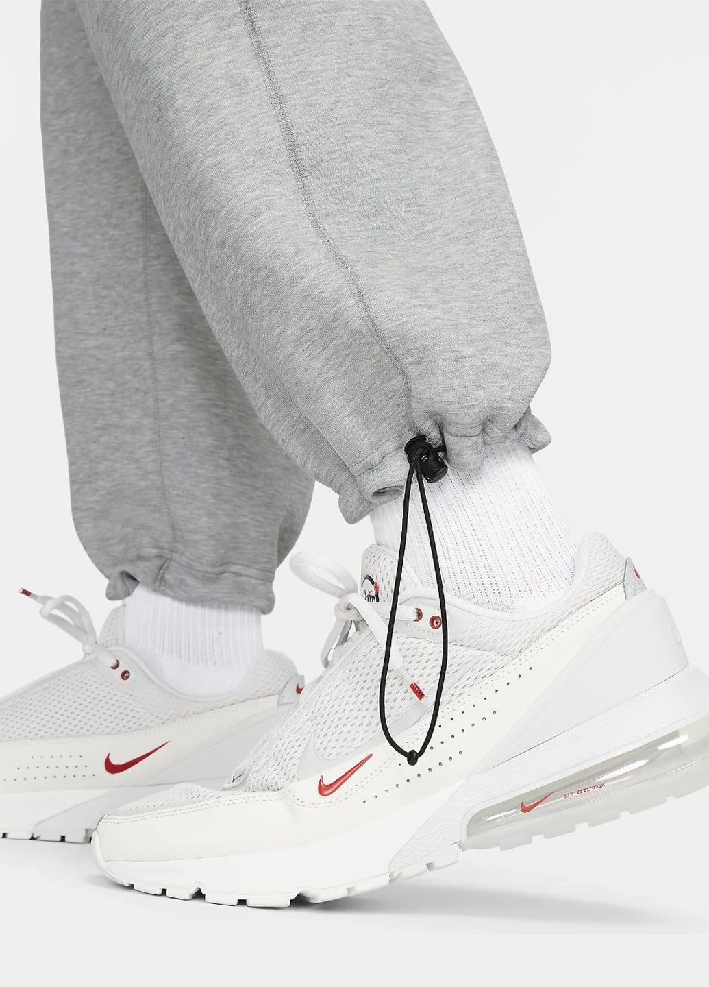 Серые спортивные демисезонные зауженные брюки Nike