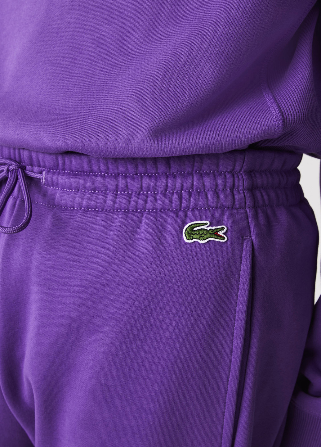 Фиолетовые спортивные демисезонные джоггеры брюки Lacoste