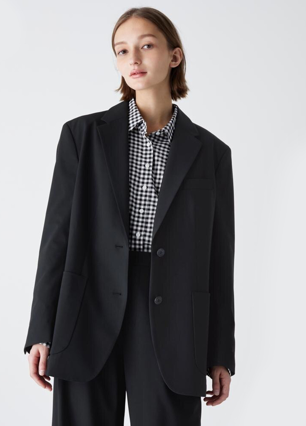Черный женский жакет Uniqlo однотонный - демисезонный