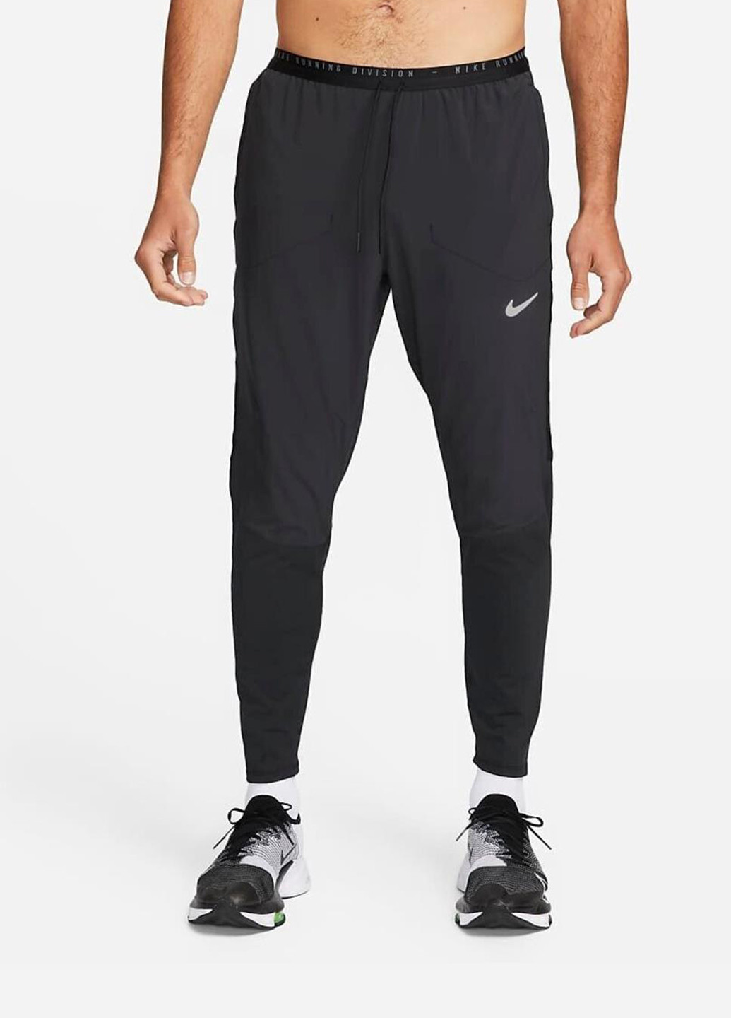 Черные спортивные демисезонные зауженные брюки Nike