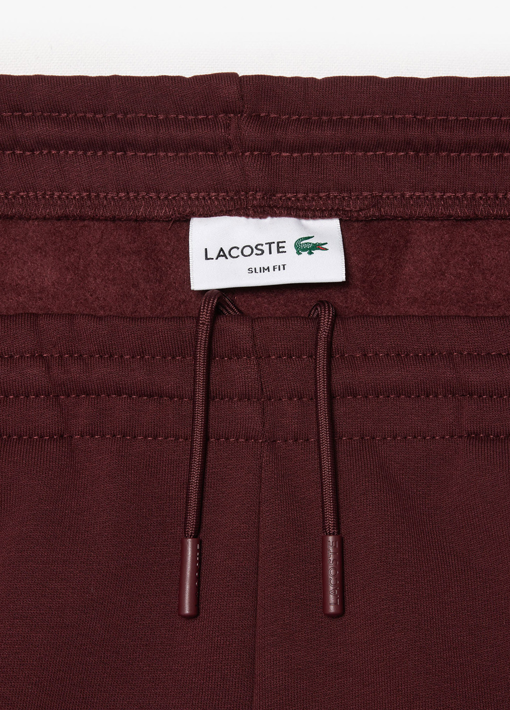 Бордовые спортивные демисезонные джоггеры брюки Lacoste