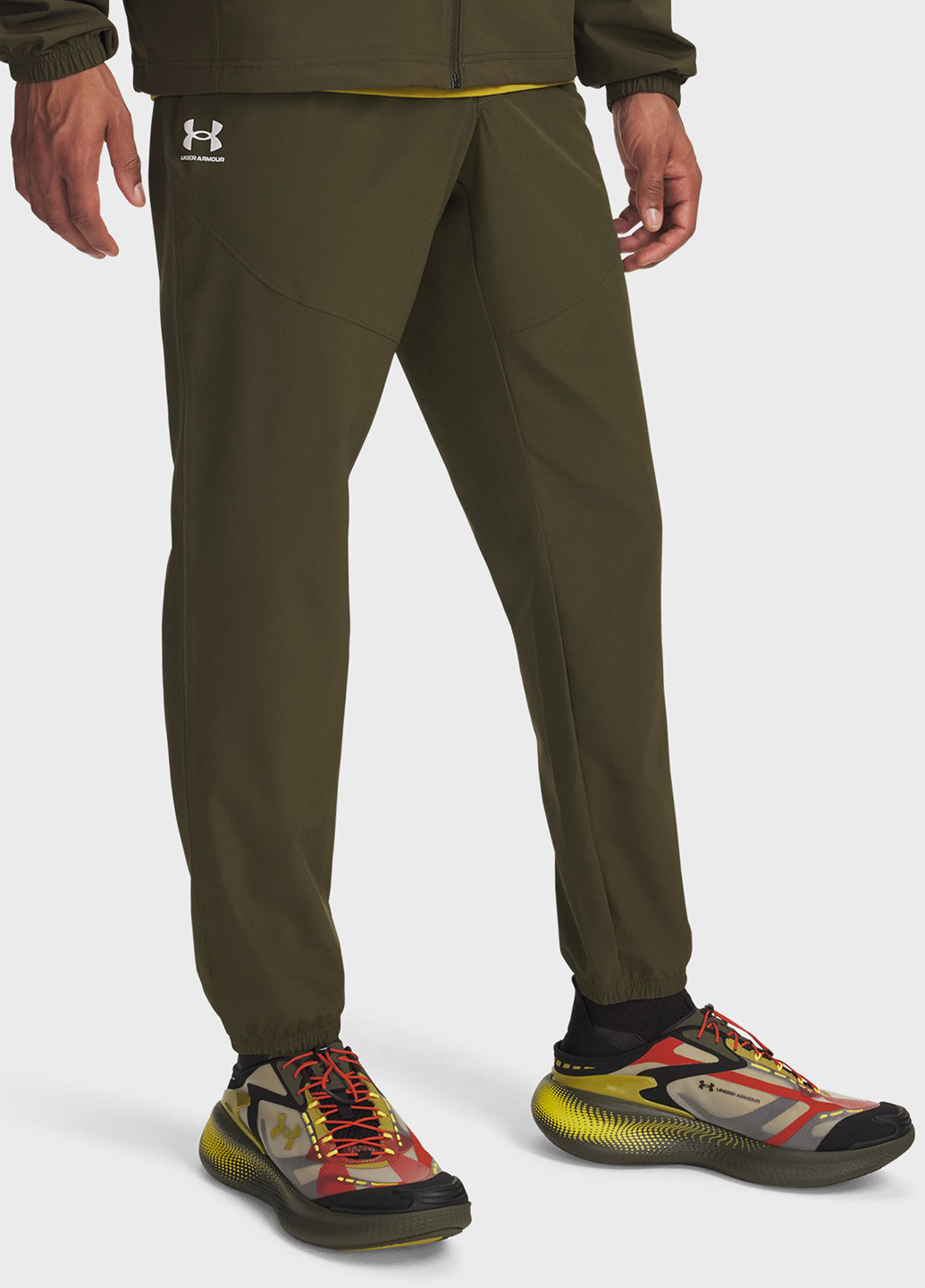 Зеленые спортивные демисезонные джоггеры брюки Under Armour