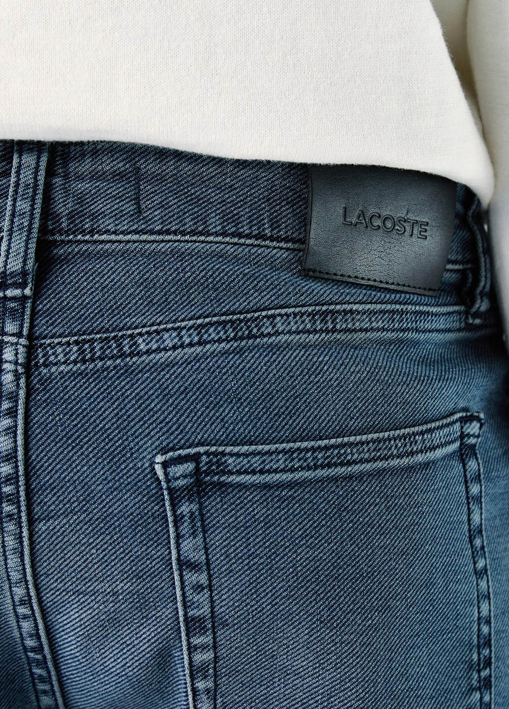 Серо-синие демисезонные зауженные джинсы Lacoste