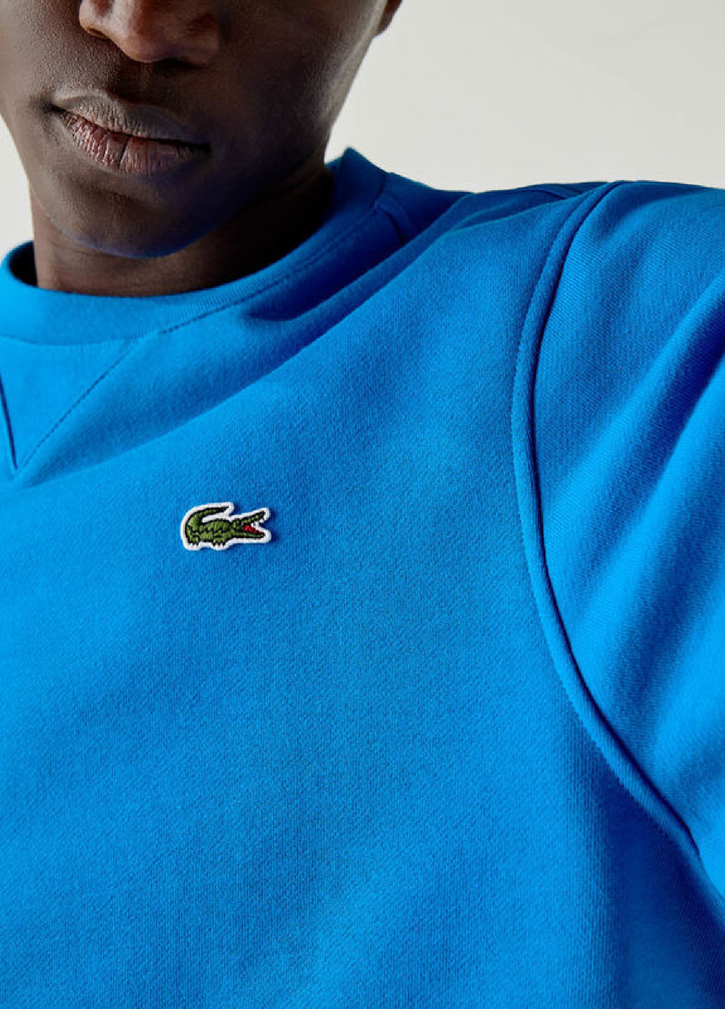 Синій світшот Lacoste однотонний нашивки (329694600)