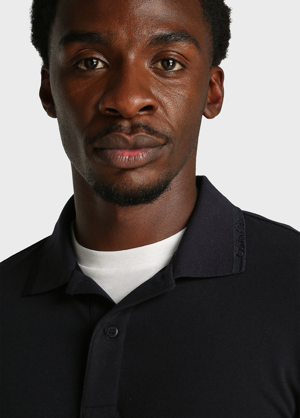 Черная футболка-поло для мужчин Calvin Klein однотонная