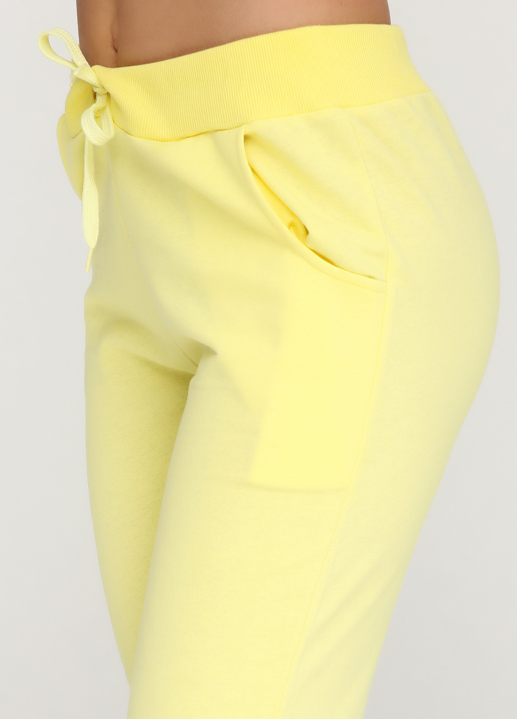 Желтые спортивные демисезонные брюки Carla Mara