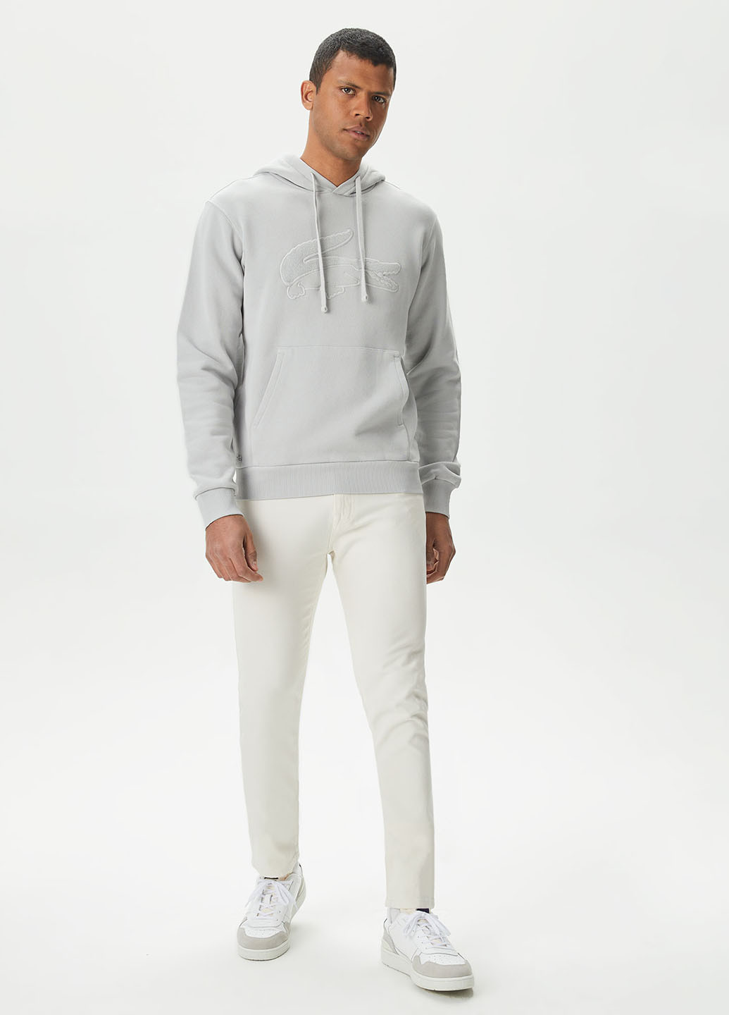 Кремовые кэжуал демисезонные зауженные брюки Lacoste