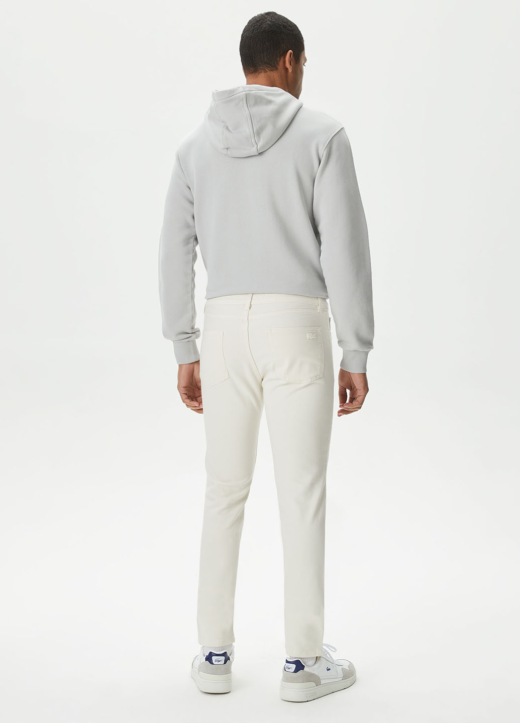 Кремовые кэжуал демисезонные зауженные брюки Lacoste