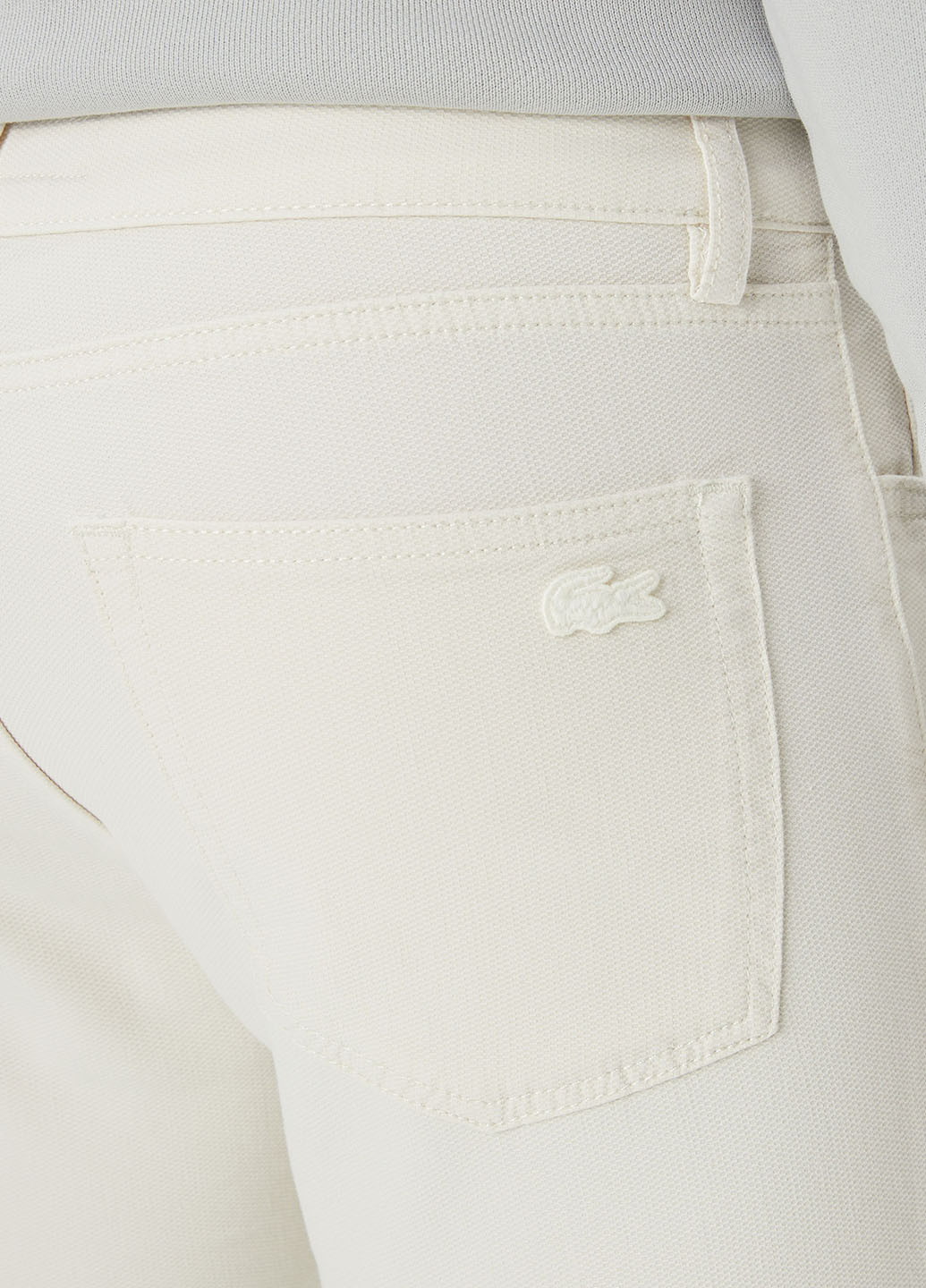 Кремовые кэжуал демисезонные зауженные брюки Lacoste