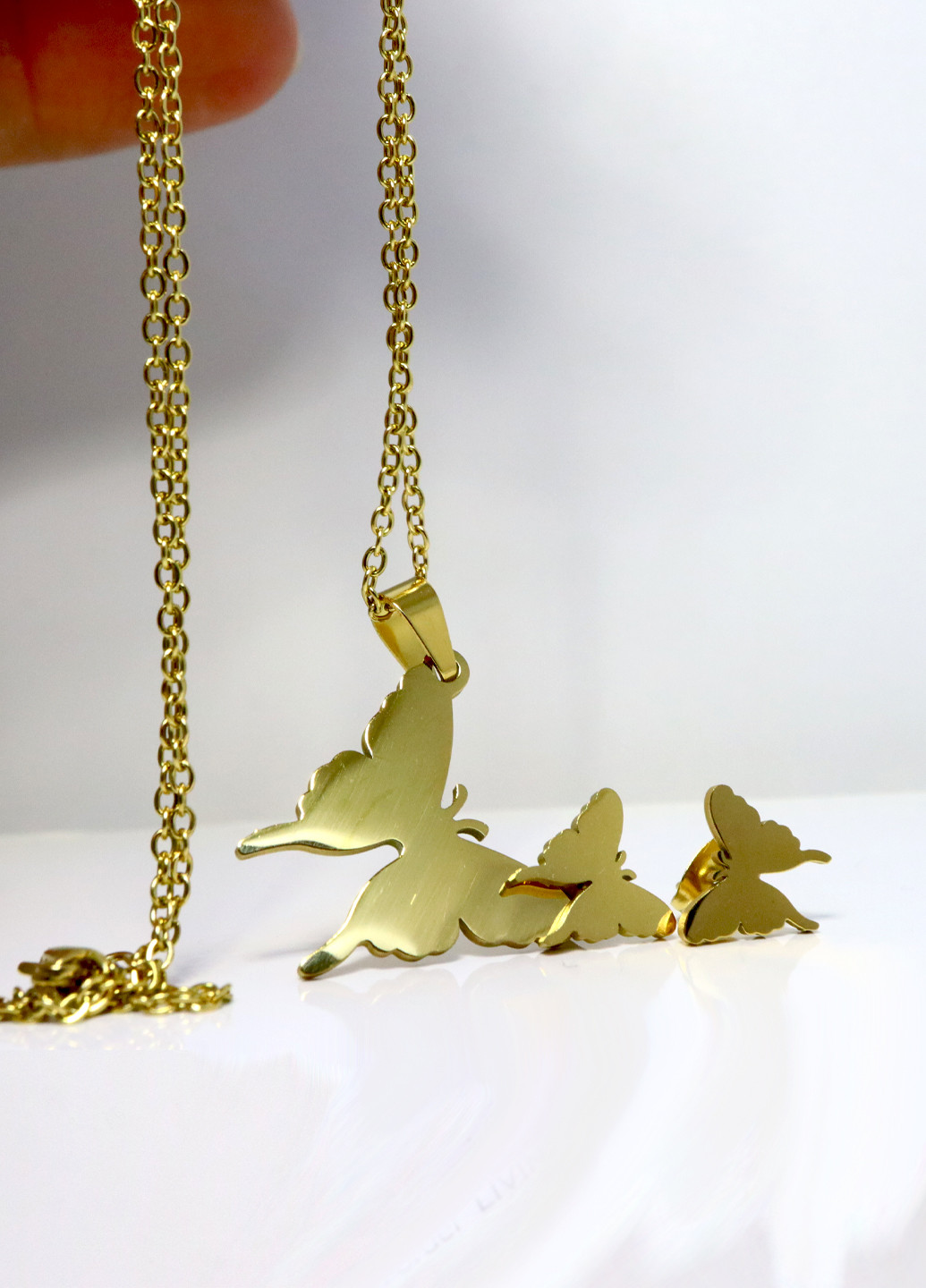 Набір ланцюжок з кулоном і сережки "Butterfly", золотистий Анна Ясеницька (256380266)