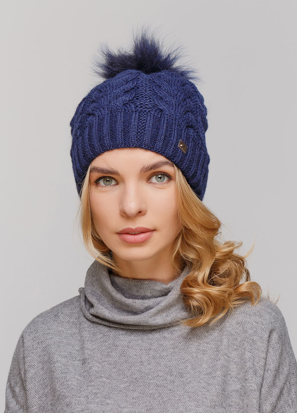 Зимняя теплая женская шапка на флисовой подкладке 550592 Merlini (249643267)