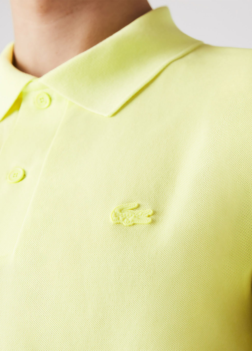 Желтая футболка-поло для мужчин Lacoste однотонная