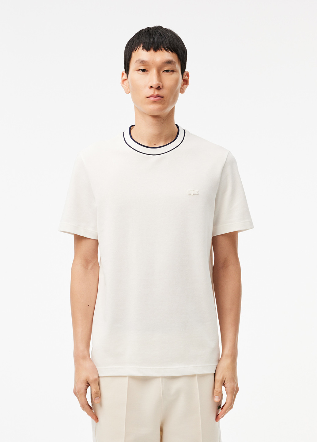 Белая футболка Lacoste