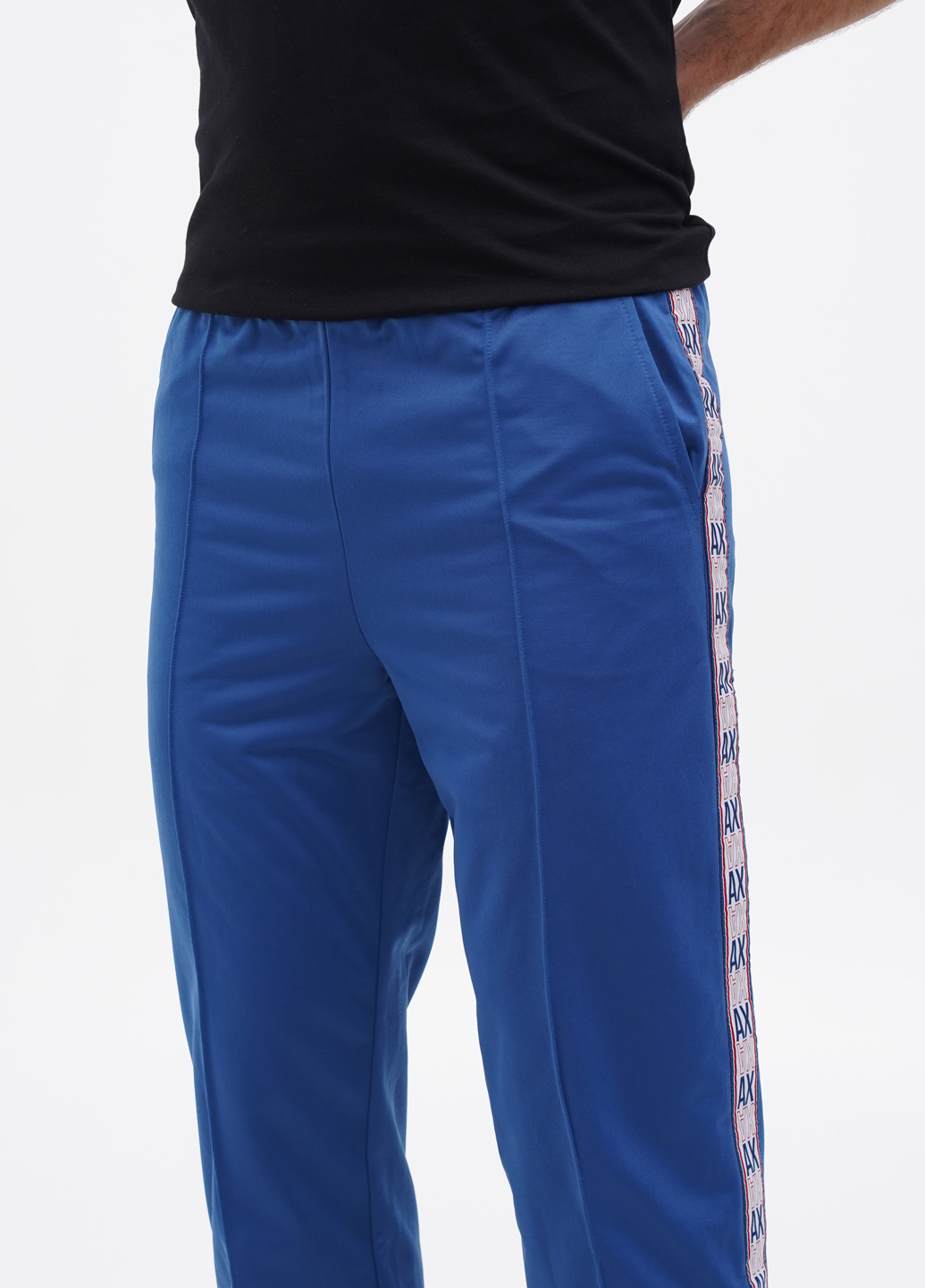 Синие спортивные демисезонные зауженные брюки Emporio Armani EA7