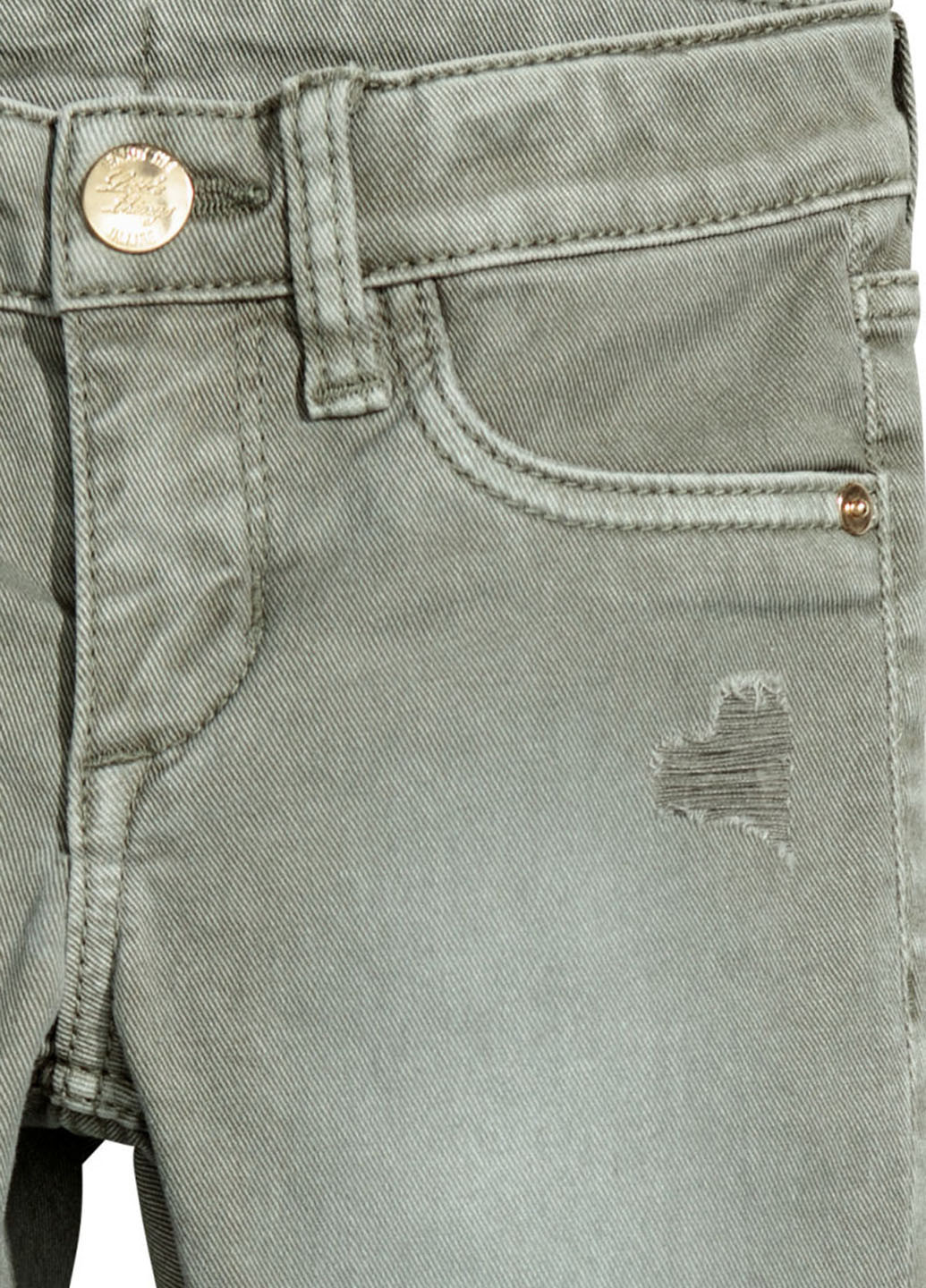 Светло-зеленые демисезонные зауженные джинсы H&M