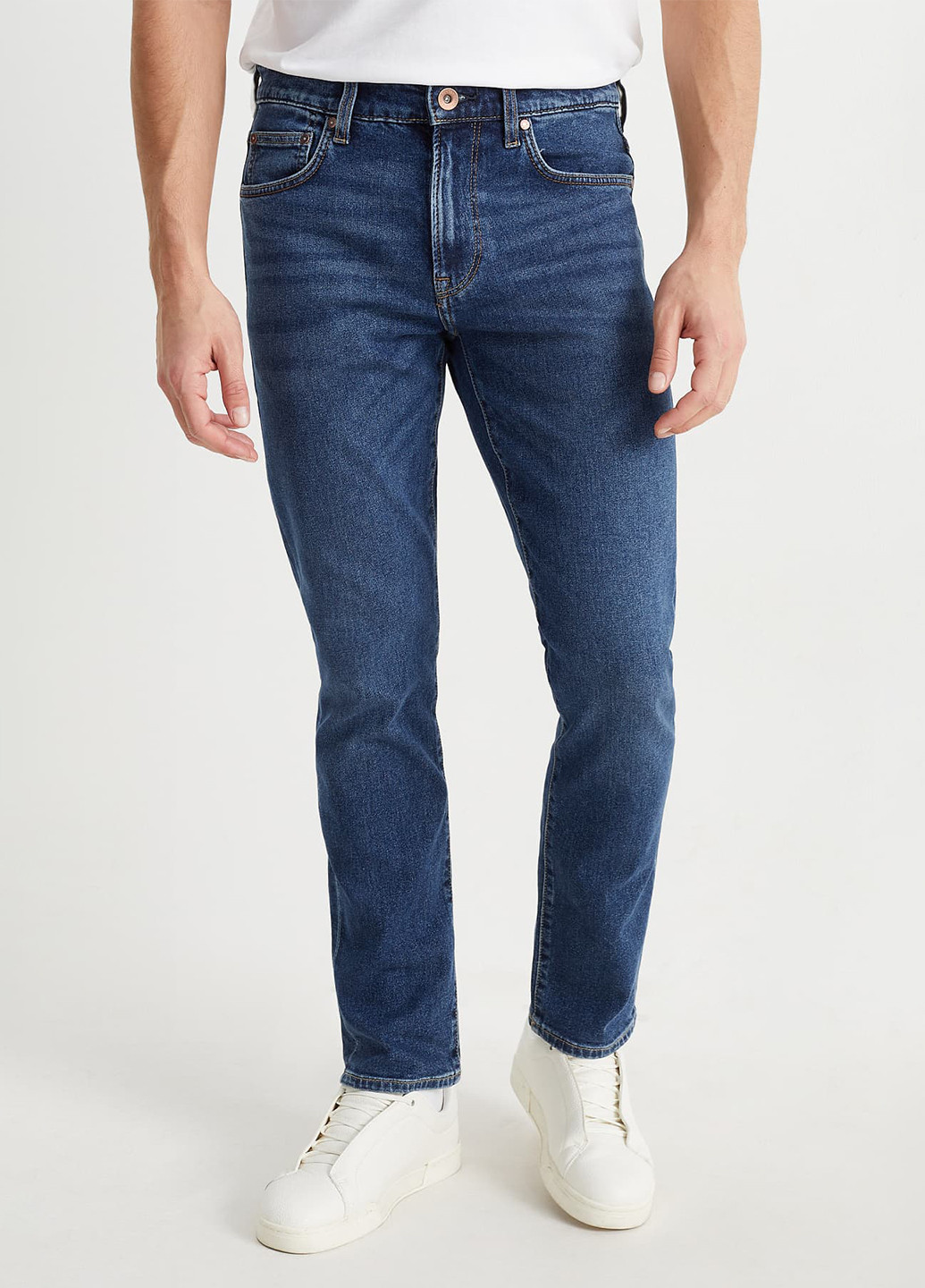 Синие демисезонные зауженные джинсы C&A