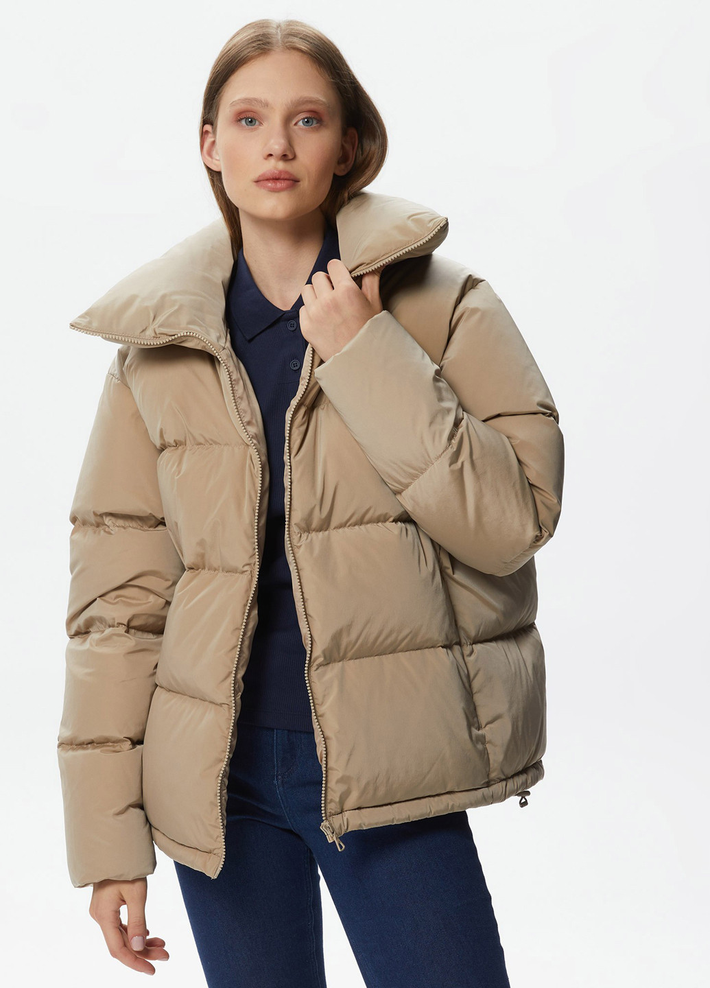 Бежевая зимняя куртка Lacoste