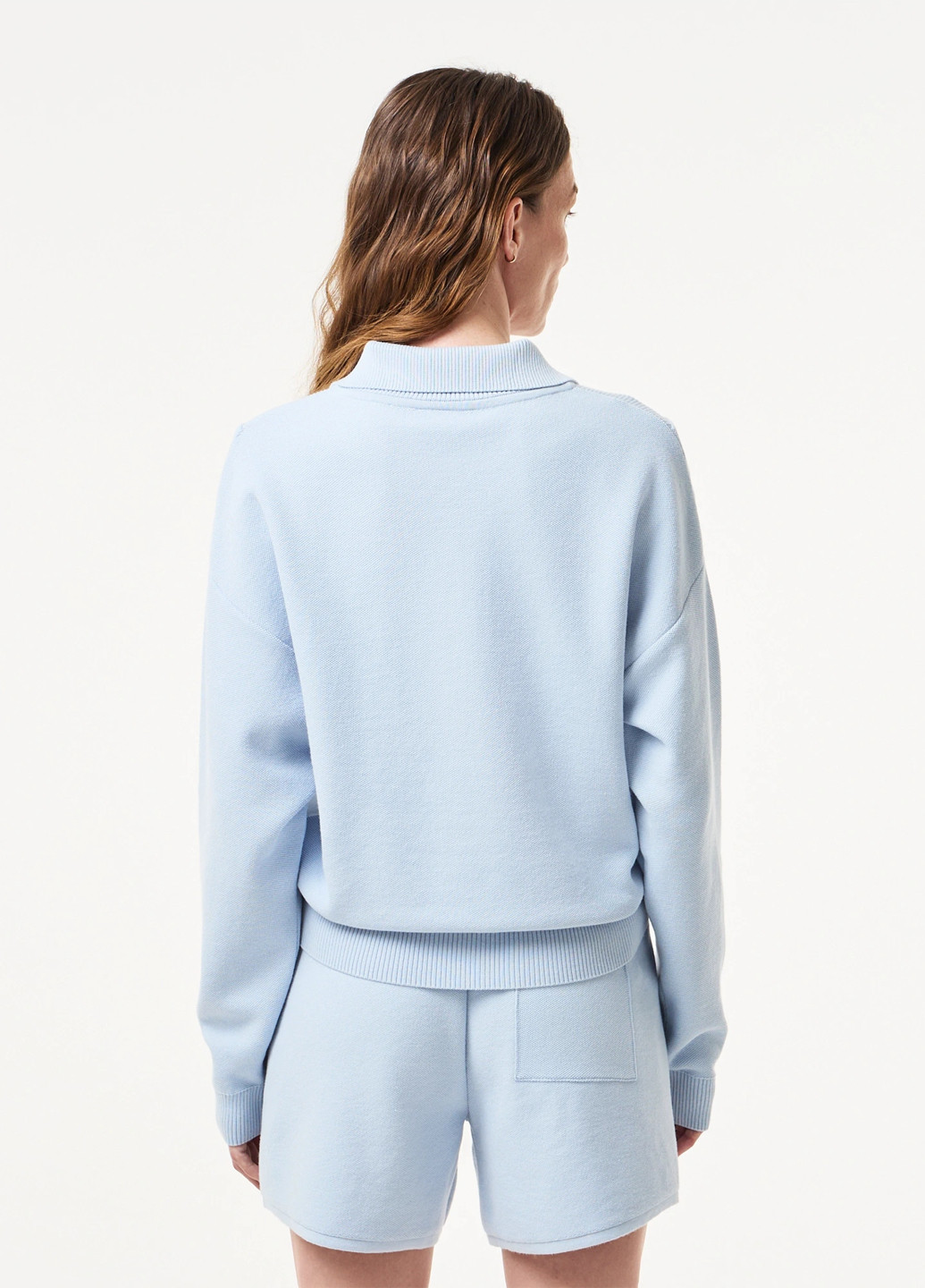 Голубой демисезонный свитер Lacoste