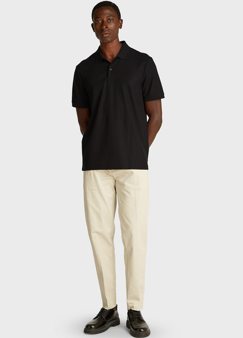 Черная футболка-поло для мужчин Calvin Klein однотонная