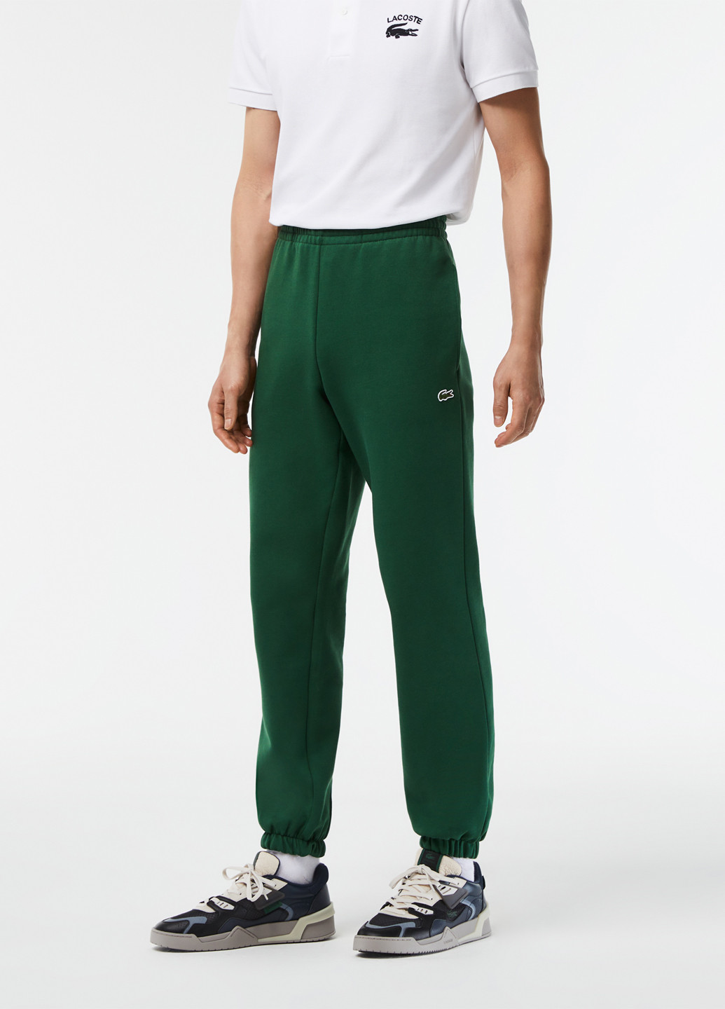 Зеленые спортивные демисезонные джоггеры брюки Lacoste