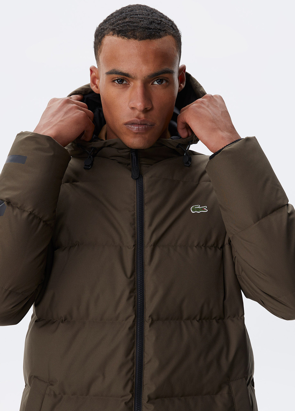 Коричневая зимняя куртка Lacoste