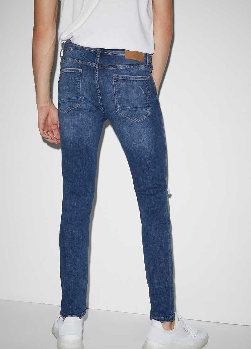 Синие демисезонные зауженные джинсы C&A