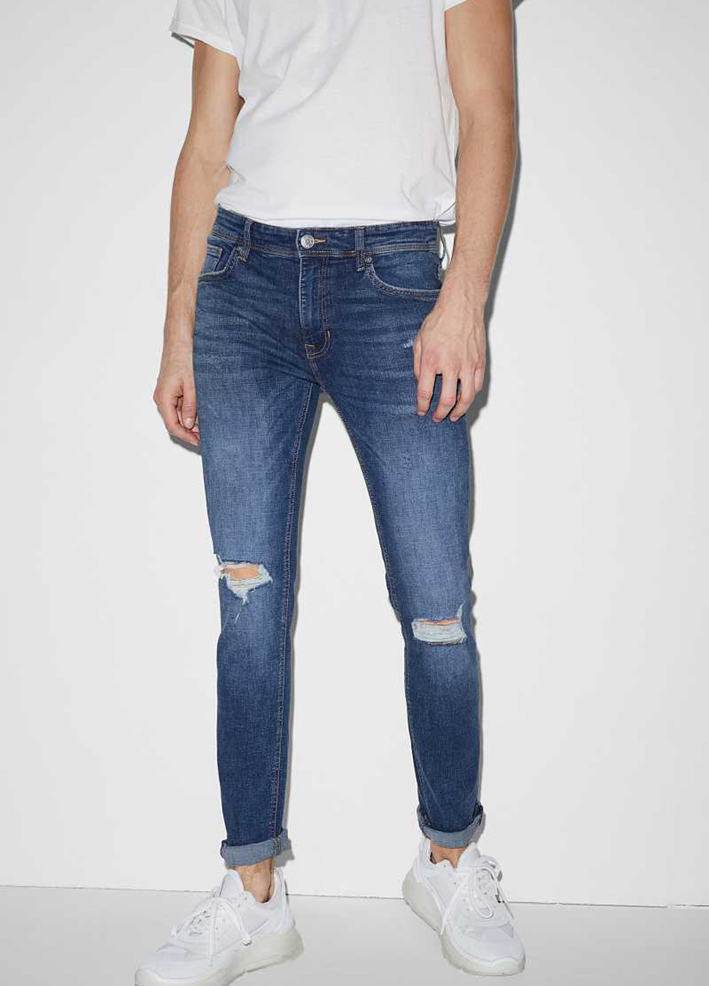 Синие демисезонные зауженные джинсы C&A