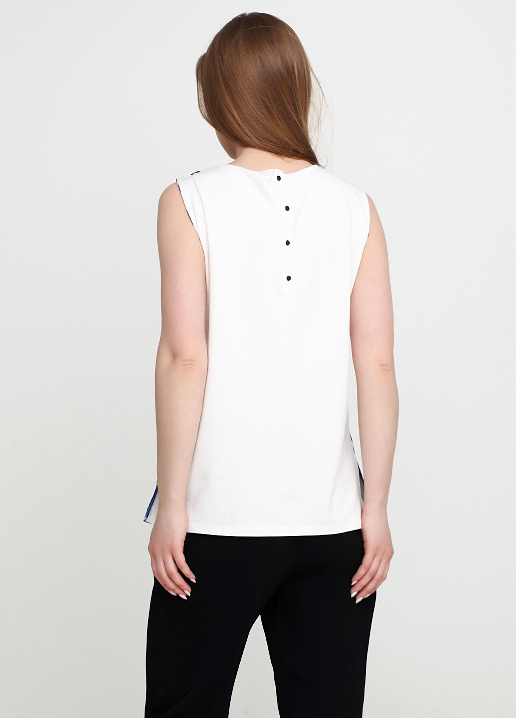 Чёрно-белую блуза Sassofono