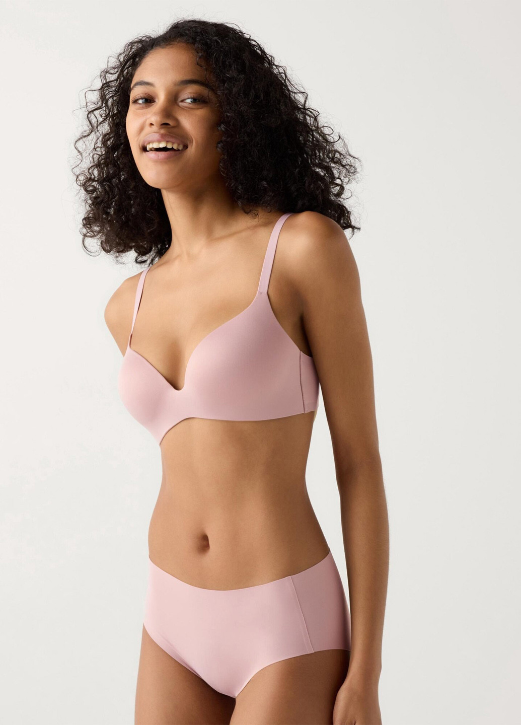 Рожевий безшовний бюстгальтер Uniqlo без кісточок поліамід