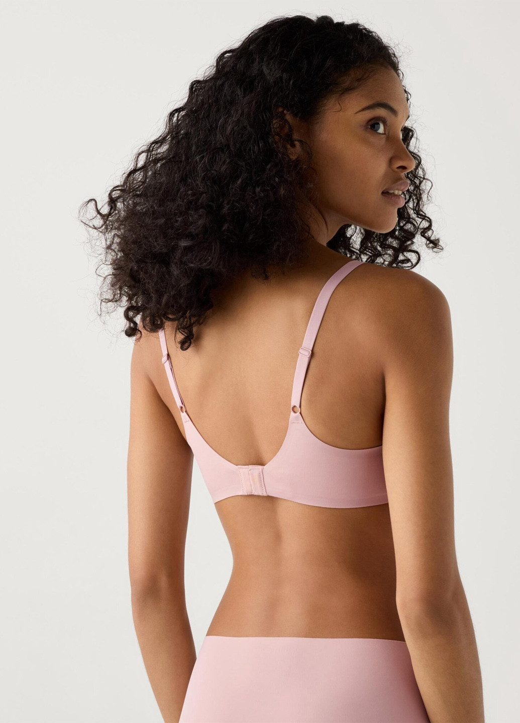 Рожевий безшовний бюстгальтер Uniqlo без кісточок поліамід