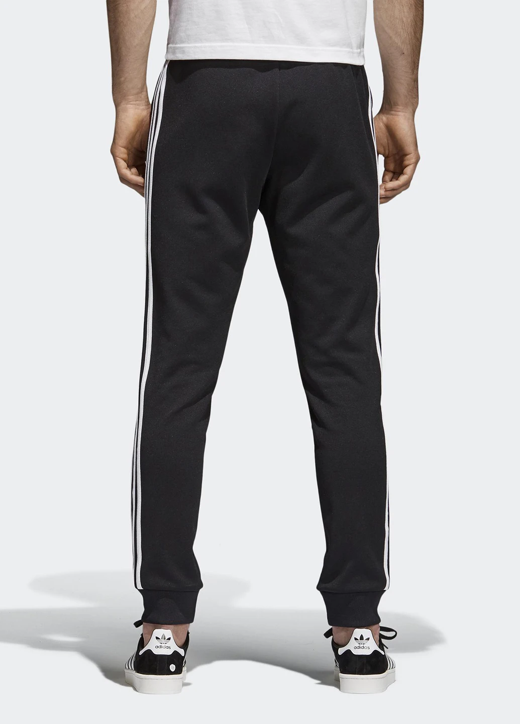 Черные спортивные демисезонные зауженные брюки adidas