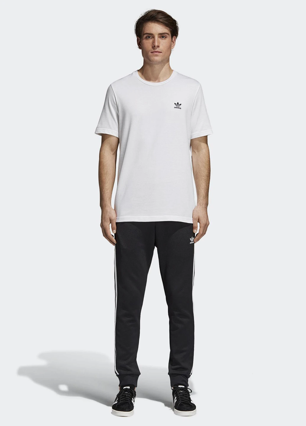 Черные спортивные демисезонные зауженные брюки adidas