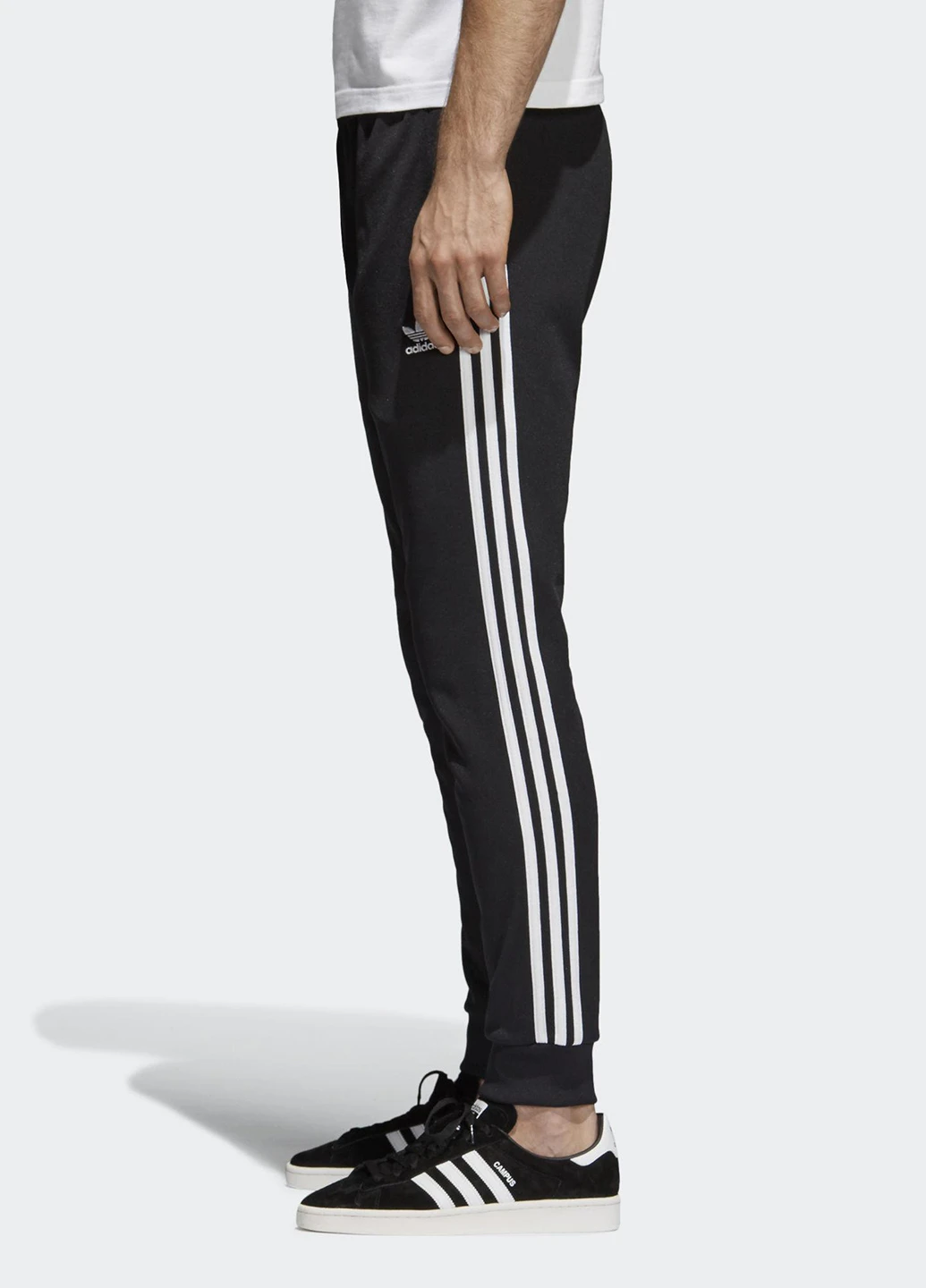 Черные спортивные демисезонные зауженные брюки adidas