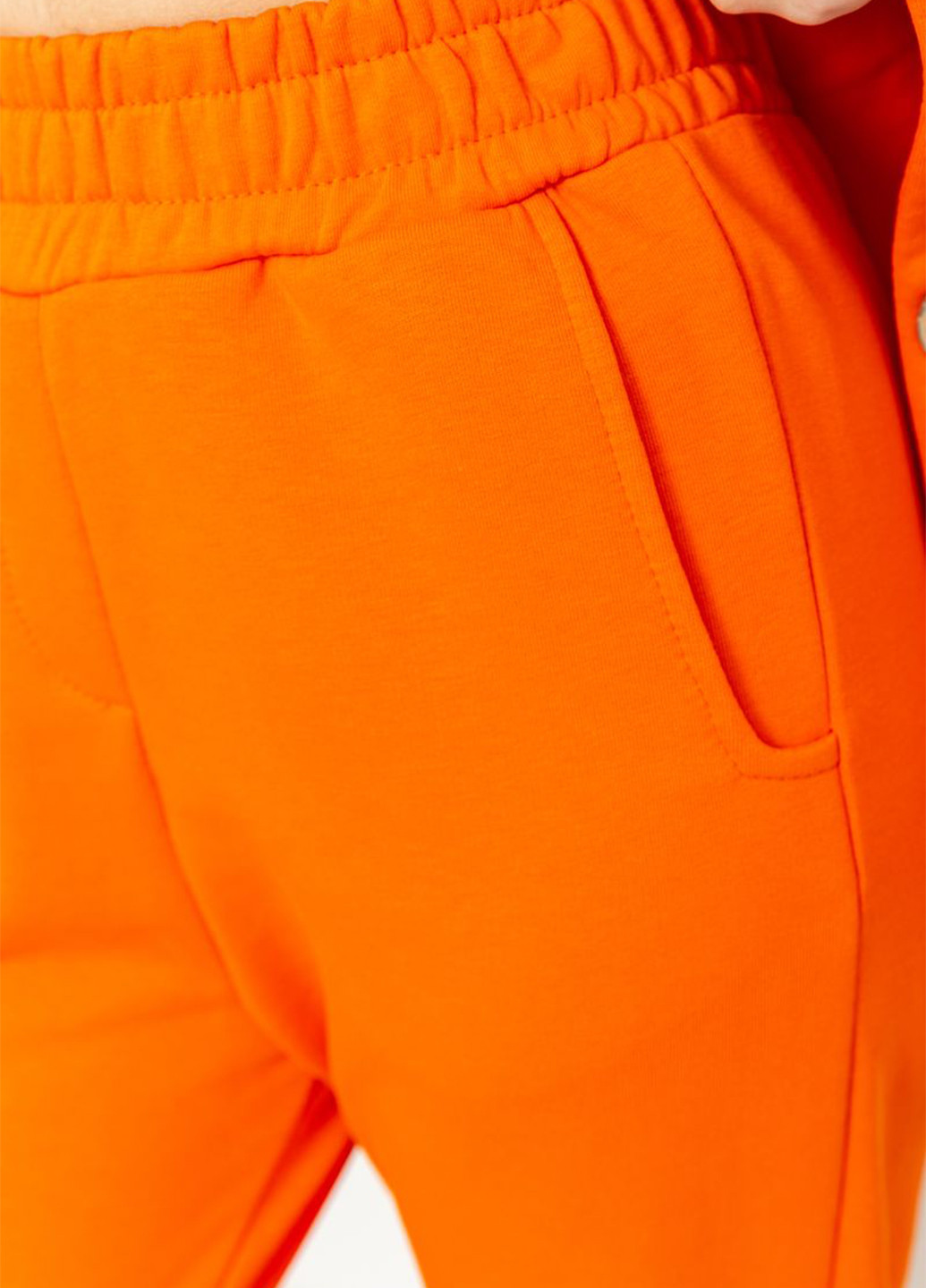 Помаранчевий демісезонний комплект (жакет, штани) Kamomile